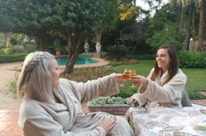Ladies sitting in spa garden L'abri day spa-Pretoria